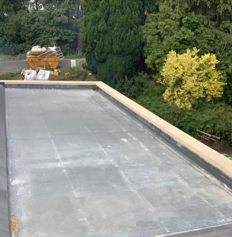 Flat roof finished with new coping stones