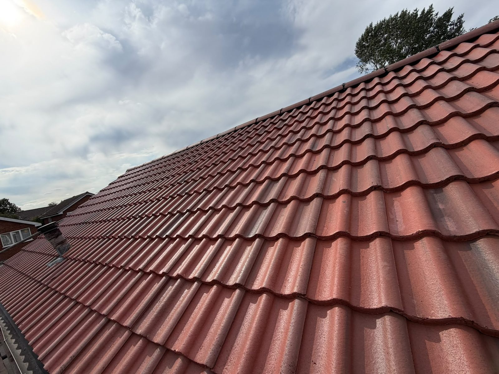 Finished re-roof in Marley Mendip Old English tiles with an all-new dry ridge